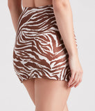 Create bold, fashion-forward looks for summer with the Wild Style Zebra Print Mini Skirt in brown, a must-have piece from Windsor’s collection of stylish bottoms for women.