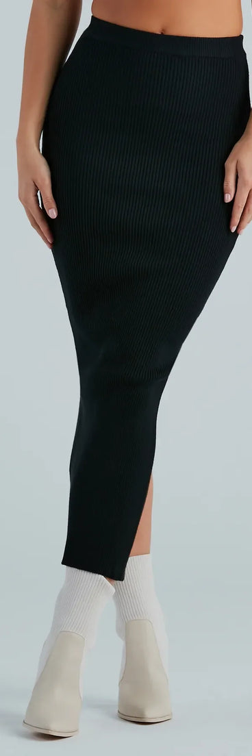 The Another Slay Sweater Knit Maxi Skirt in black is a women's workwear essential with an elevated fabric and chic silhouette, ideal for layering and versatile enough to take your look from office chic to going-out ready!