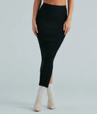 The Another Slay Sweater Knit Maxi Skirt in black is a women's workwear essential with an elevated fabric and chic silhouette, ideal for layering and versatile enough to take your look from office chic to going-out ready!