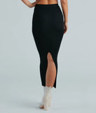 The Another Slay Sweater Knit Maxi Skirt in black is a women's workwear essential with an elevated fabric and chic silhouette, ideal for layering and versatile enough to take your look from office chic to going-out ready!