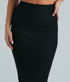 The Another Slay Sweater Knit Maxi Skirt in black is a women's workwear piece offering a trendy style and unique accents, perfect for effortlessly creating an outfit-of-the-day look that transitions your office look to going-out ready.