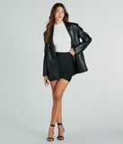 The Oh-So-Snatched Bandage Mini Skirt is a trendy women's bottom in black, designed with modern details and alluring textures to complete chic outfits for 2025.
