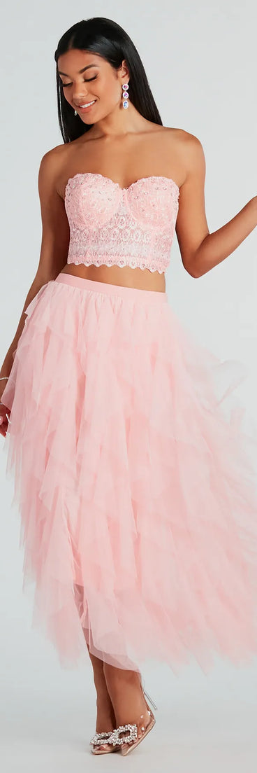 The A Little Drama Ruffled Tulle Midi Skirt in pink is a women's workwear essential with an elevated fabric and chic silhouette, ideal for layering and versatile enough to take your look from office chic to going-out ready!