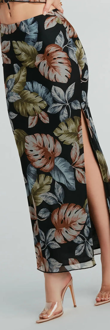 The Gorgeous Getaway Tropical Print Maxi Skirt is a trendy women's bottom in black, designed with modern details and alluring textures to complete chic outfits for 2025.