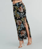 The Gorgeous Getaway Tropical Print Maxi Skirt is a trendy women's bottom in black, designed with modern details and alluring textures to complete chic outfits for 2025.