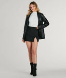 Create bold, fashion-forward looks for summer with the Fabulous Fit Side Slit Knit Mini Skirt in black, a must-have piece from Windsor’s collection of stylish bottoms for women.