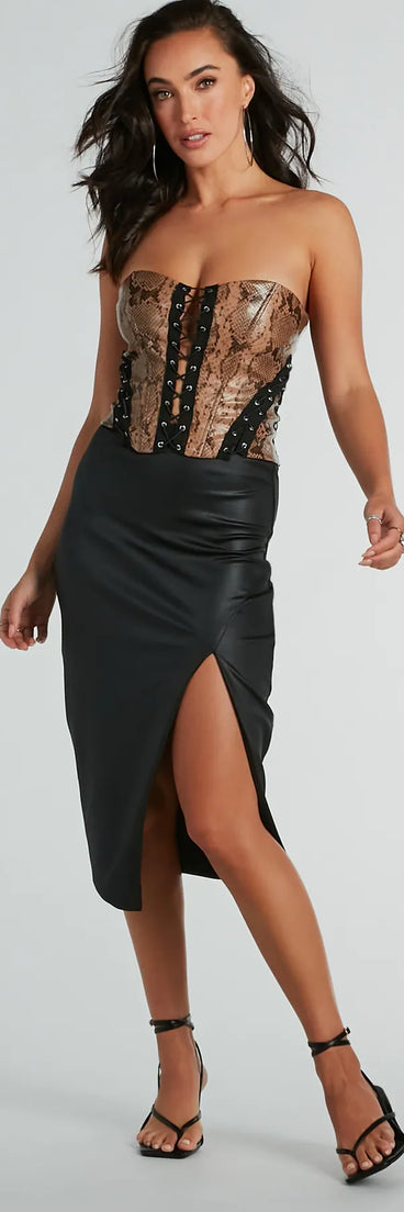 The Major Bae High-Rise Faux Leather Midi Skirt in black is a women's workwear essential with an elevated fabric and chic silhouette, ideal for layering and versatile enough to take your look from office chic to going-out ready!