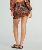 The Destined For Sun Tropical Mesh Mini Skirt is a trendy women's bottom in black, designed with modern details and alluring textures to complete chic outfits for 2025.