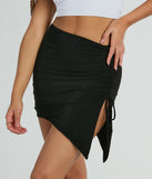 The Hold It Down Ruched Asymmetrical Mini Skirt is a trendy women's bottom in black, designed with modern details and alluring textures to complete chic outfits for 2025.