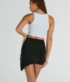 Create bold, fashion-forward looks for spring or summer with the Hold It Down Ruched Asymmetrical Mini Skirt in black, a must-have piece from Windsor’s collection of stylish bottoms for women.