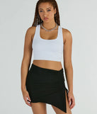 The Hold It Down Ruched Asymmetrical Mini Skirt in black features a short, flattering cut designed to elevate your look with just the right amount of edge.