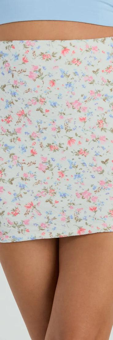 The In The Valley High Rise Floral Eyelet Mini Skirt in ivory is a women's workwear piece offering a trendy style and unique accents, perfect for effortlessly creating an outfit-of-the-day look that transitions your office look to going-out ready.