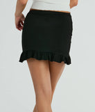 Create bold, fashion-forward looks for spring or summer with the Made Ya Wink Mid-Rise Ruffle Mini Skirt in black, a must-have piece from Windsor’s collection of stylish bottoms for women.