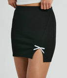The Loveliest Look Bow Ponte Slit Mini Skirt is a trendy women's bottom in black, designed with modern details and alluring textures to complete chic outfits for 2025.