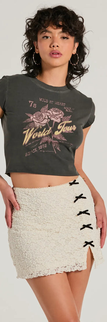 The Bound To Charm High-Rise Texture Lace Bow Mini Skirt in ivory brings edge and energy to your vibe, ready to elevate any festival look or concert outfit.