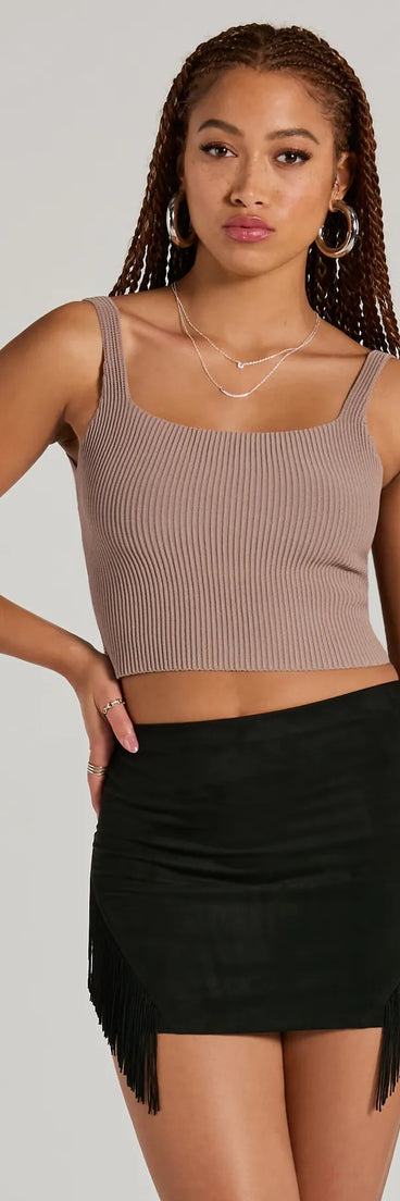 The Boho Flair High Rise Fringe Faux Suede Mini Skirt is a trendy women's bottom in black, designed with modern details and alluring textures to complete chic outfits for 2025.