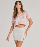 The Sleek Status Faux Leather Mini Skirt is a trendy women's bottom in ivory, designed with modern details and alluring textures to complete chic outfits for 2025.