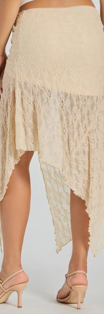 The Breezy Boho Sheer Lace Asymmetric Maxi Skirt is a trendy women's bottom in ivory, designed with modern details and alluring textures to complete chic outfits for 2025.