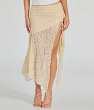 Create bold, fashion-forward looks for spring or summer with the Breezy Boho Sheer Lace Asymmetric Maxi Skirt in ivory, a must-have piece from Windsor’s collection of stylish bottoms for women.