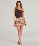 The Adorable In Floral Mesh Drop Waist Mini Skirt in brown is a women's workwear essential with an elevated fabric and chic silhouette, ideal for layering and versatile enough to take your look from office chic to going-out ready!