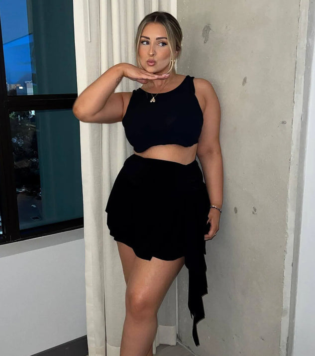 Pair the Major Flirt Drop Waist Smooth Knit Ruffled Mini Skirt with your favorite crop or bodysuit for effortless warm-weather looks with on-trend black skirts that speak your style.