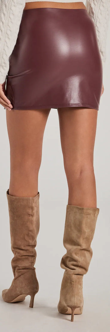 The Bold Allure Faux Leather Mini Skirt is a trendy women's bottom in wine, designed with modern details and alluring textures to complete chic outfits for 2025.