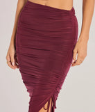 Create bold, fashion-forward looks for spring or summer with the Sculpted Chic Ruched Midi Skirt in plum, a must-have piece from Windsor’s collection of stylish bottoms for women.