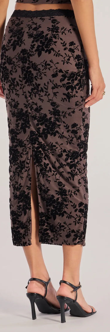 The Luxe Touch Flocked Velvet Midi Skirt is a trendy women's bottom in brown, designed with modern details and alluring textures to complete chic outfits for 2025.