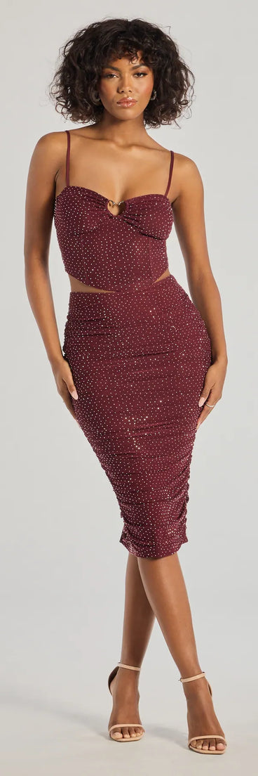 The Bright Vibes Ruched Rhinestone Midi Skirt is a trendy women's bottom in plum, designed with modern details and alluring textures to complete chic outfits for 2025.