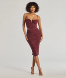 The Bright Vibes Ruched Rhinestone Midi Skirt is a trendy women's bottom in plum, designed with modern details and alluring textures to complete chic outfits for 2025.