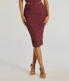 The Bright Vibes Ruched Rhinestone Midi Skirt is a trendy women's bottom in plum, designed with modern details and alluring textures to complete chic outfits for 2025.
