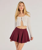 Perfect for creating a fashionable Valentine's Day outfit, the Trendy Twirl Pleated Ponte Skater Skirt is a chic burgundy bottom for women with romantic and modern flair, ideal for date night or Galentine’s celebrations.