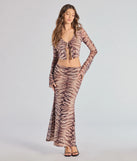 Serve effortless style and scroll-stopping energy in the Strut It Out Abstract Zebra Maxi Skirt, part of a brown matching clothing set that does the work for you with bold, polished vibes from top to bottom.