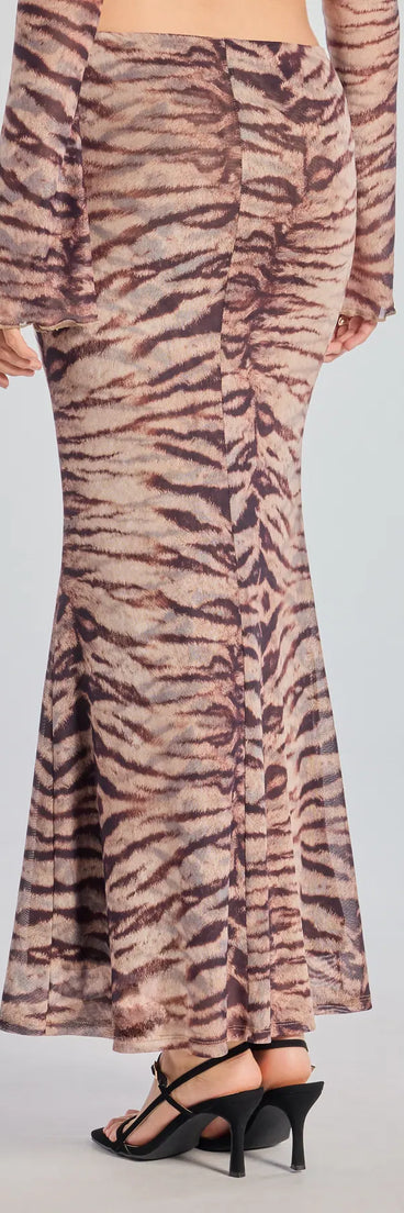 Create bold, fashion-forward looks for any event or for your page with the Strut It Out Abstract Zebra Maxi Skirt in brown, a must-have piece from Windsor’s collection of stylish bottoms for women.