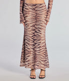 Create bold, fashion-forward looks for summer with the Strut It Out Abstract Zebra Maxi Skirt in brown, a must-have piece from Windsor’s collection of stylish bottoms for women.