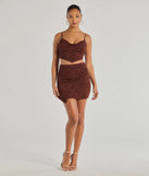 The Glowing Radiance Glitter Mini Skirt is a trendy women's bottom in brown, designed with modern details and alluring textures to complete chic outfits for 2025.
