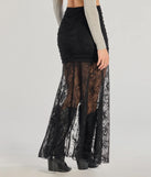 The Keep A Secret Lace Slit Maxi Skirt is a trendy women's bottom in black, designed with modern details and alluring textures to complete chic outfits for 2025.