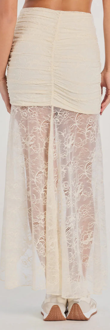 Create bold, fashion-forward looks for any event or for your page with the Boho Beauty High Slit Lace Maxi Skirt in ivory, a must-have piece from Windsor’s collection of stylish bottoms for women.