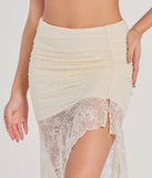 Create bold, fashion-forward looks for spring or summer with the Boho Beauty High Slit Lace Maxi Skirt in ivory, a must-have piece from Windsor’s collection of stylish bottoms for women.