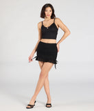 Create bold, fashion-forward looks for spring or summer with the Perfect Match High-Rise Lace Mini Skirt in black, a must-have piece from Windsor’s collection of stylish bottoms for women.