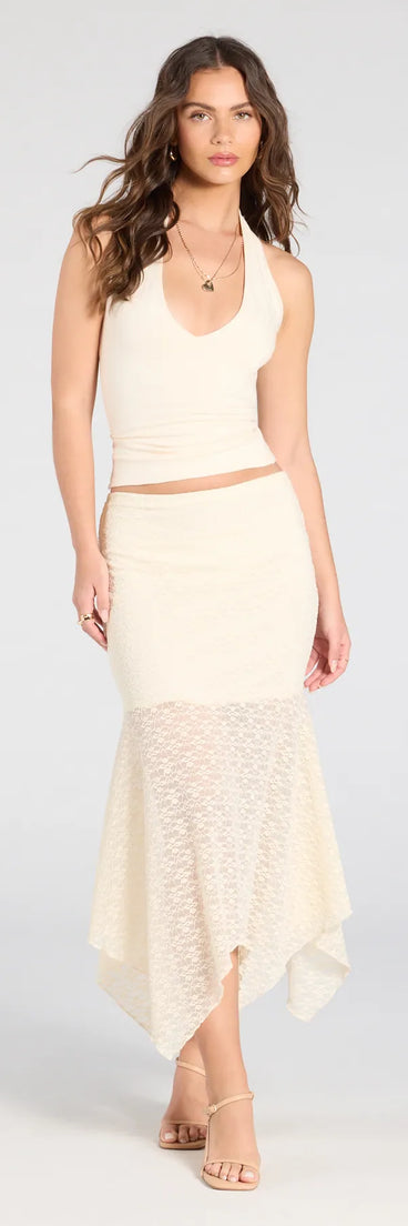 Designed for campus outfits, sleek workwear, and on-the-go moments, the Boho Babe Lace Hanky Hem Maxi Skirt is a trendy ivory bottom for women bringing effortless fall versatility.