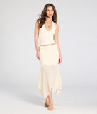 Create bold, fashion-forward looks for summer with the Boho Babe Lace Hanky Hem Maxi Skirt in ivory, a must-have piece from Windsor’s collection of stylish bottoms for women.