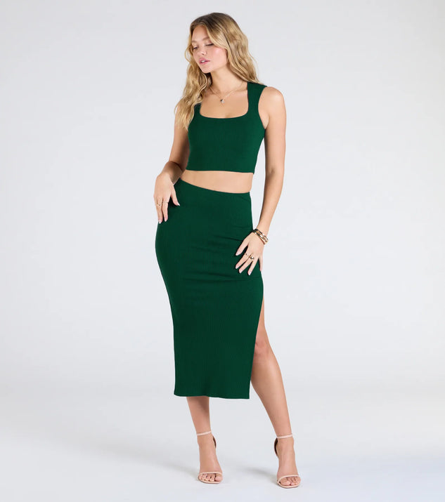 Create bold, fashion-forward looks for spring or summer with the Elevated Era Ribbed Knit High Slit Midi Skirt in hunter green, a must-have piece from Windsor’s collection of stylish bottoms for women.