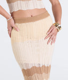 Create bold, fashion-forward looks for spring or summer with the Trendy Match Chevron Knit Midi Skirt in natural, a must-have piece from Windsor’s collection of stylish bottoms for women.