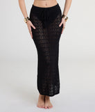 The Bohemian Vibes Crochet Knit Maxi Skirt in black brings edge and energy to your vibe, ready to elevate any festival look or concert outfit.