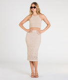 Create bold, fashion-forward looks for spring or summer with the Geometric Knit Midi Skirt in natural, a must-have piece from Windsor’s collection of stylish bottoms for women.
