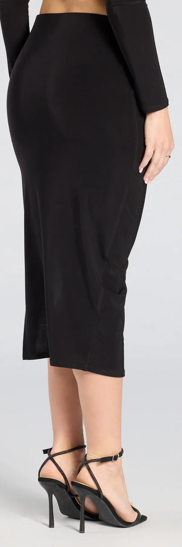 The Bold Staple Ruched Asymmetrical Midi Skirt is a trendy women's bottom in black, designed with modern details and alluring textures to complete chic outfits for 2025.