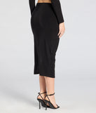 The Bold Staple Ruched Asymmetrical Midi Skirt is a trendy women's bottom in black, designed with modern details and alluring textures to complete chic outfits for 2025.