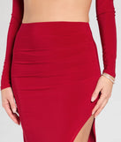Create bold, fashion-forward looks for spring or summer with the Bold Staple Ruched Asymmetrical Midi Skirt in red, a must-have piece from Windsor’s collection of stylish bottoms for women.