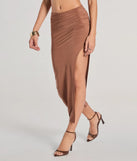 Complete your summer wardrobe with the The One High-Rise Slit Maxi Skirt, a trendy skirt in brown made to mix, match, and stand out.